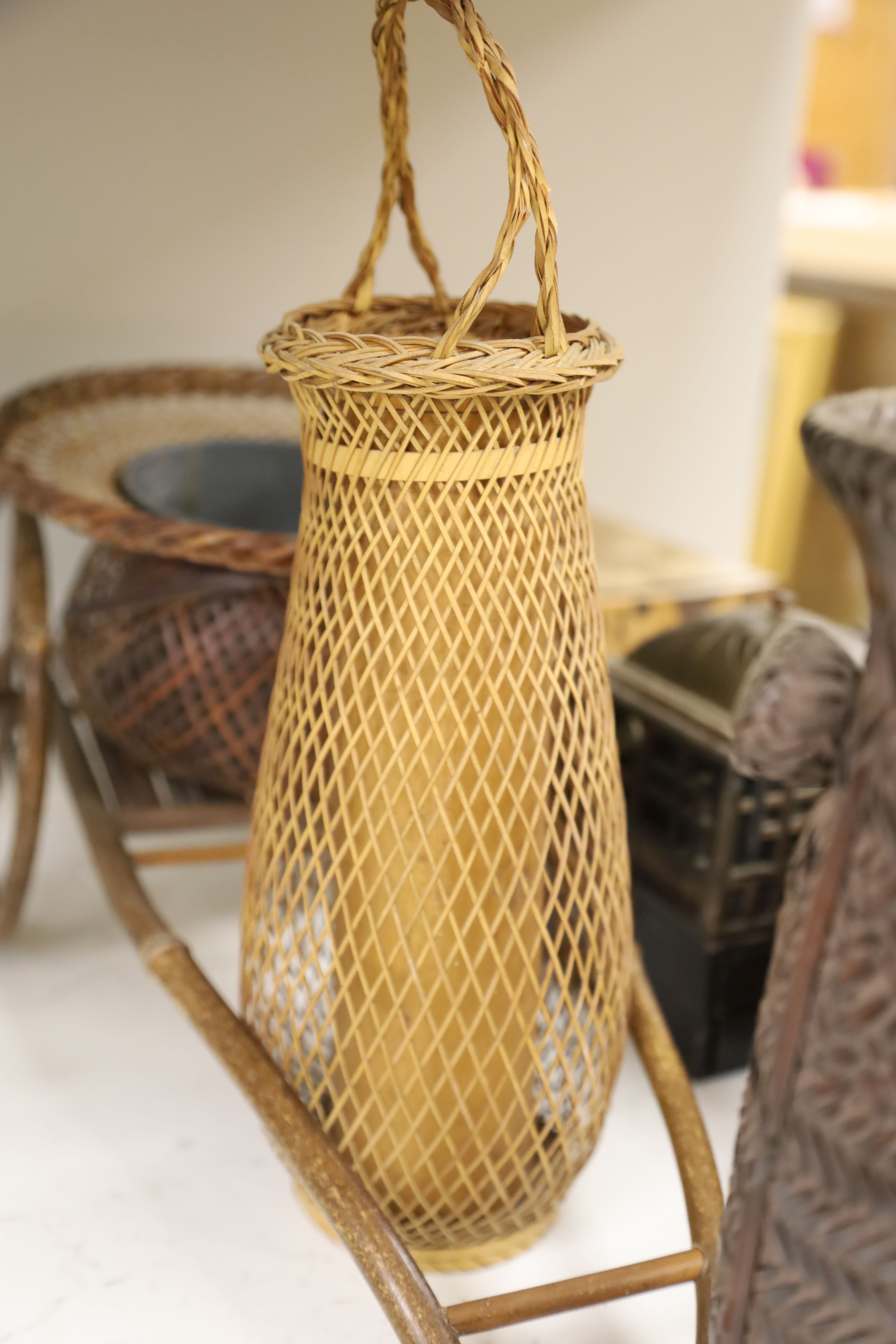 A group of Japanese lacquer wares, a portable smoking set and three basket weave ikebana (11)